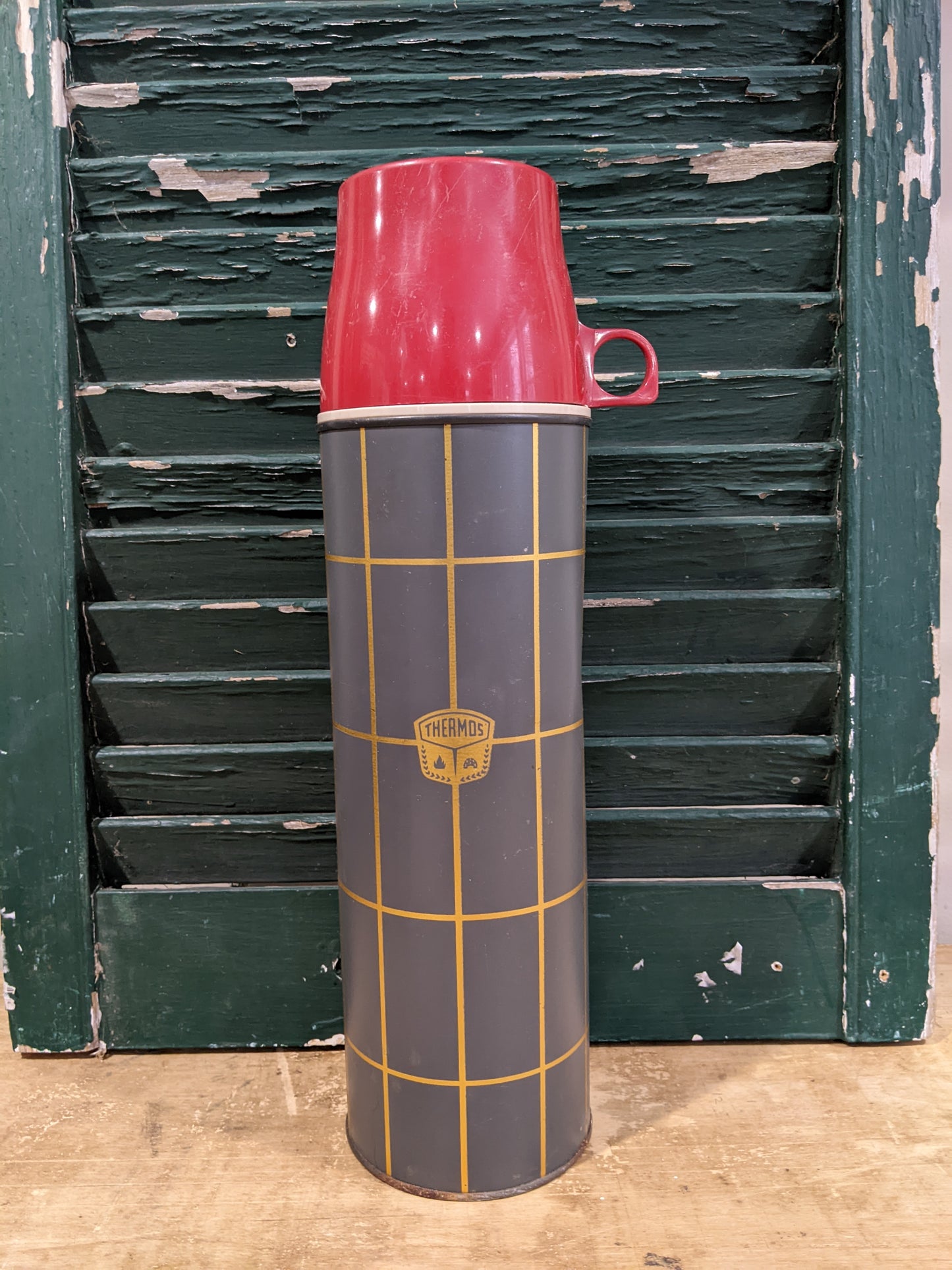 Gray with red cap thermos