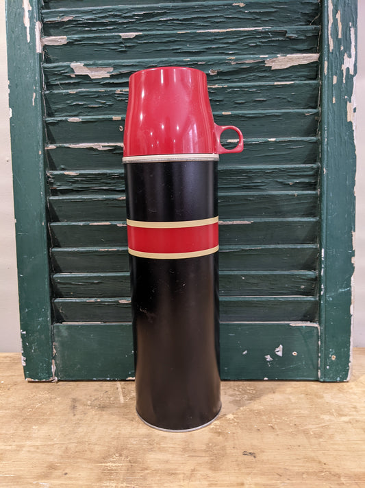 Thermos with red and tan stripe
