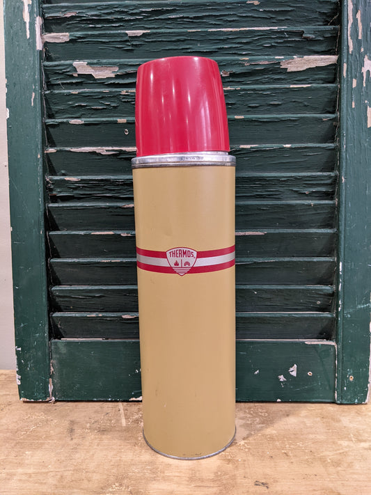 Tan with red and black stripe thermos