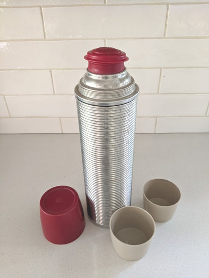 Thermos silver with red cap